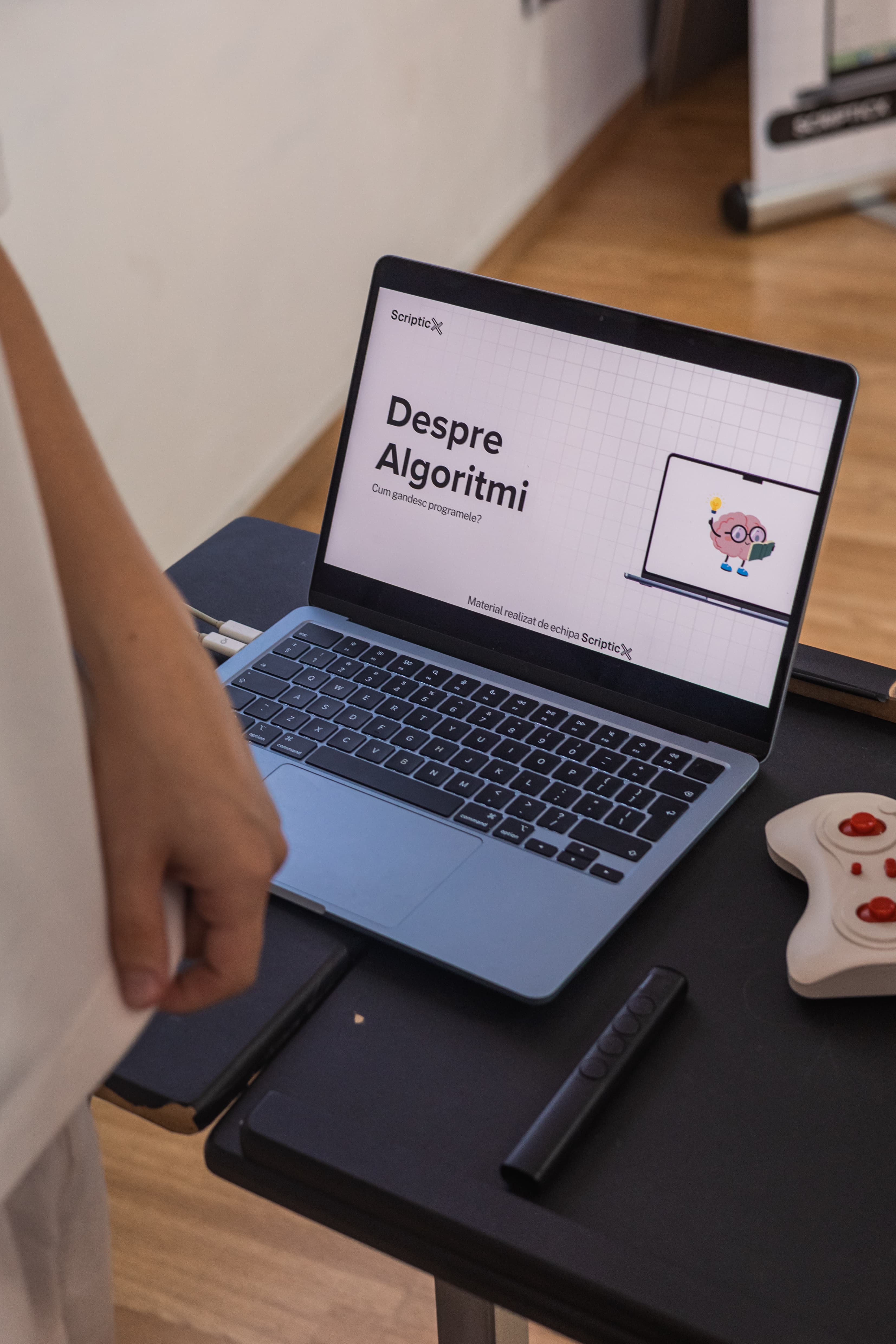 A programming lesson displayed on a laptop